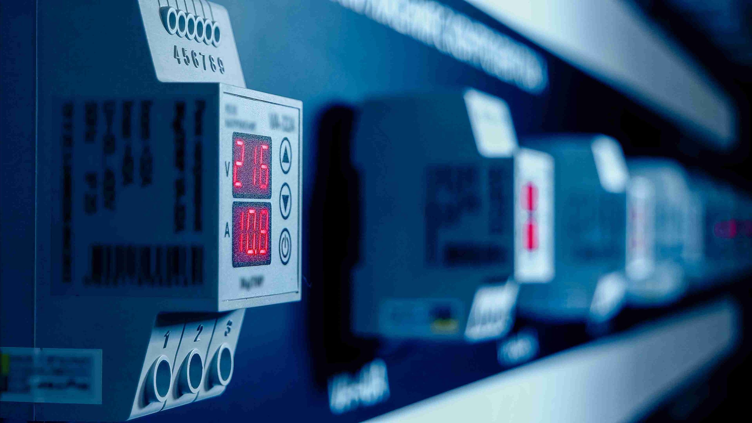 Close-up of a digital display showing red numbers on an electronic device.